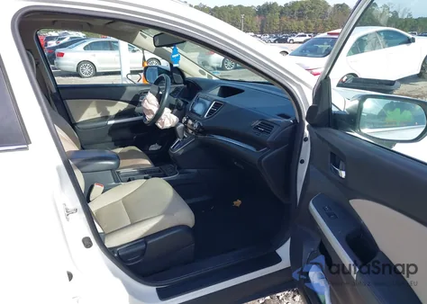 2016 Honda Cr-V Touring z USA, uszkodzony, nr VIN 5J6RM3H99GL001988